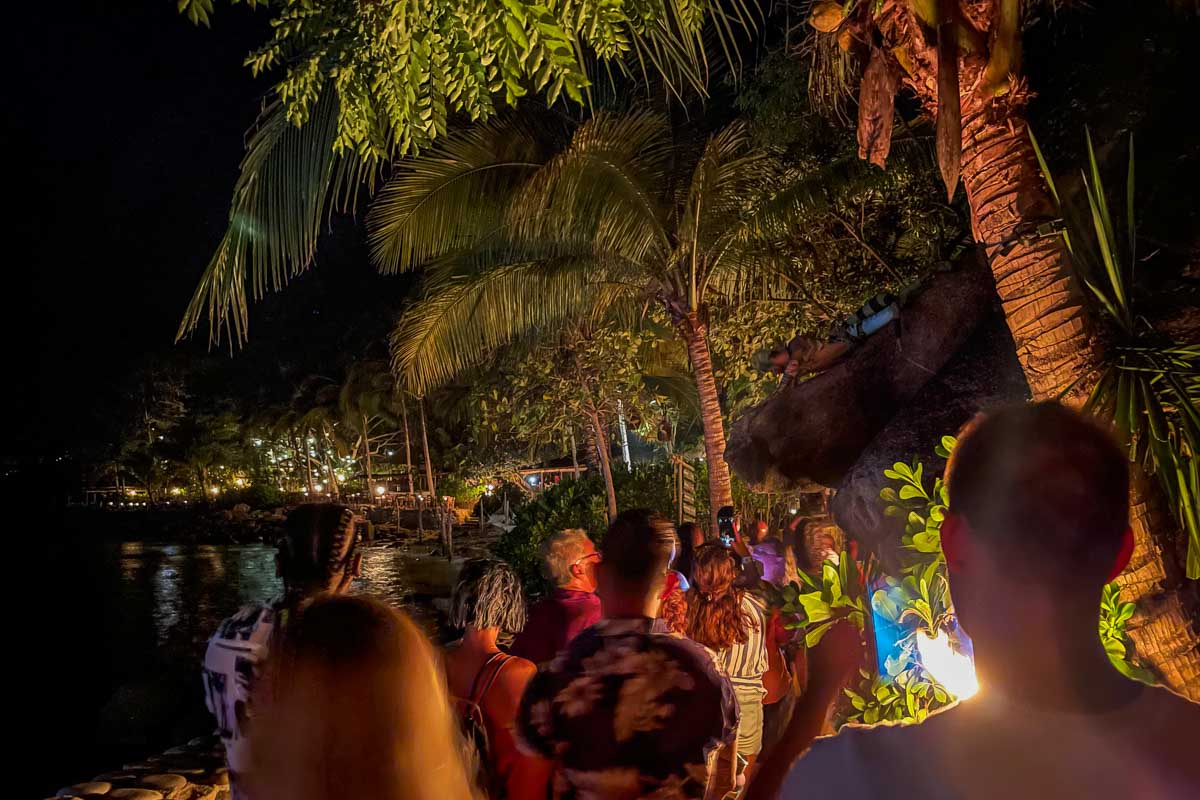People walk into the Rhythms of the Night show in Puerto Vallarta after getting off the boat.
