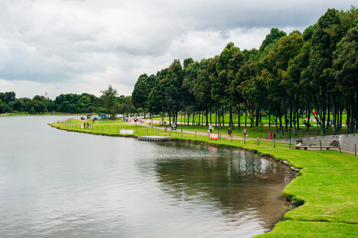 view of the lake and trees at Simón Bolívar park in Bogota, Colombia