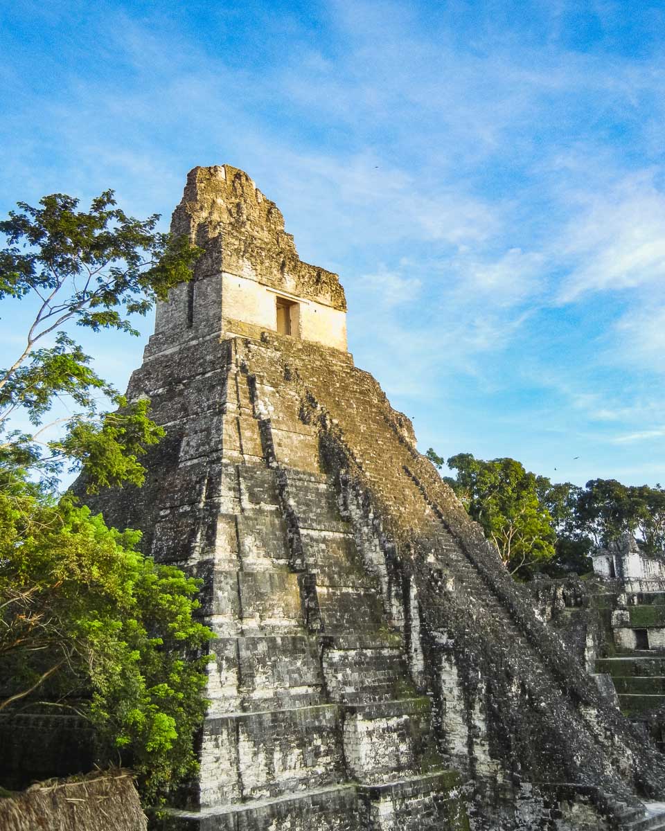 A large temple stands tall in Tikal