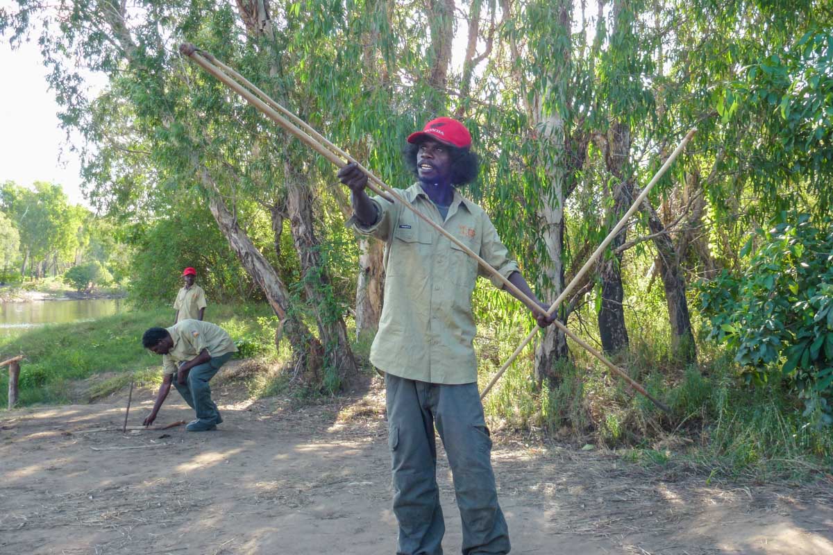 A local aboriginal shows how to hunt in Australia
