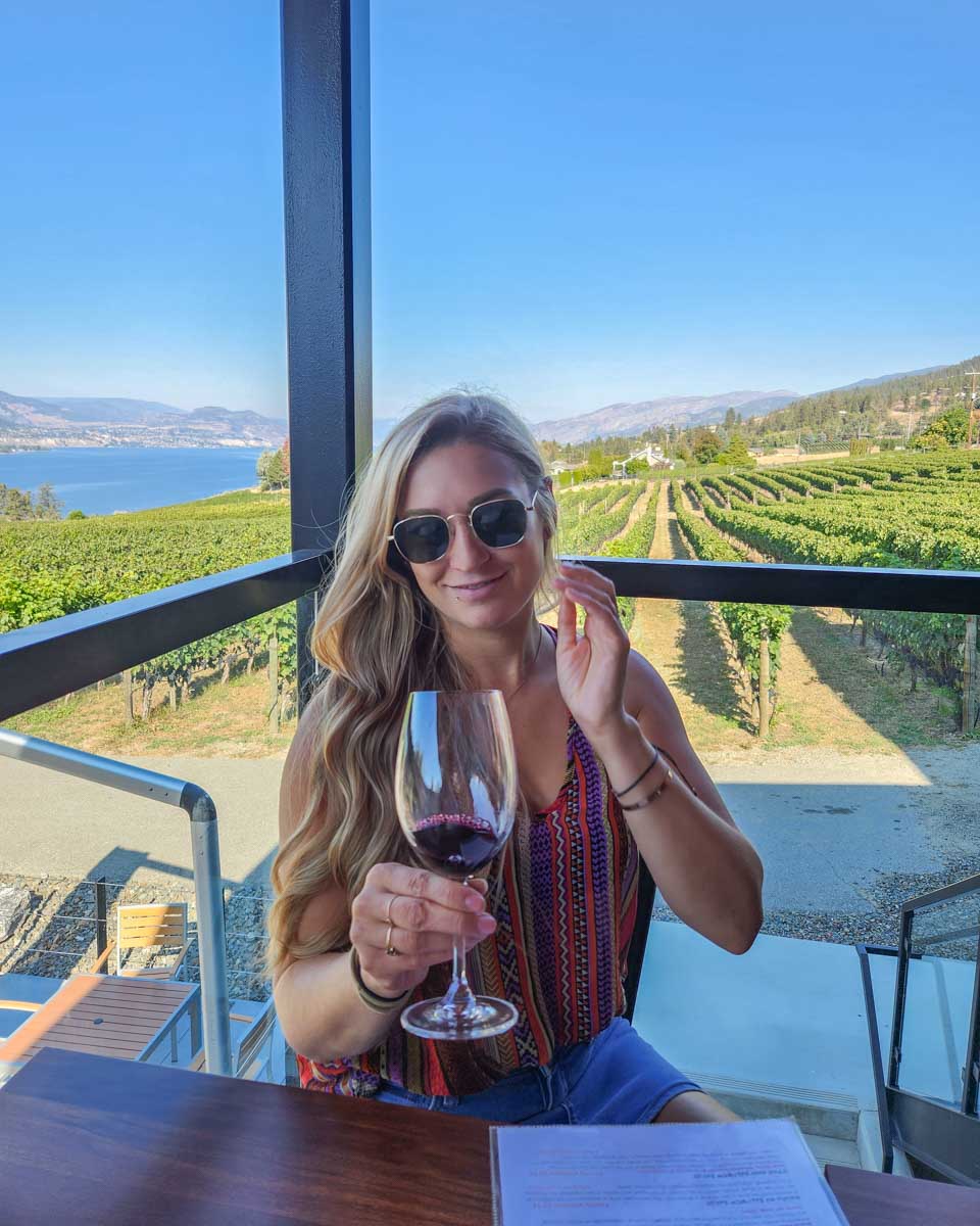 Bailey drinks wine at Moraine Estate Winery, Canada