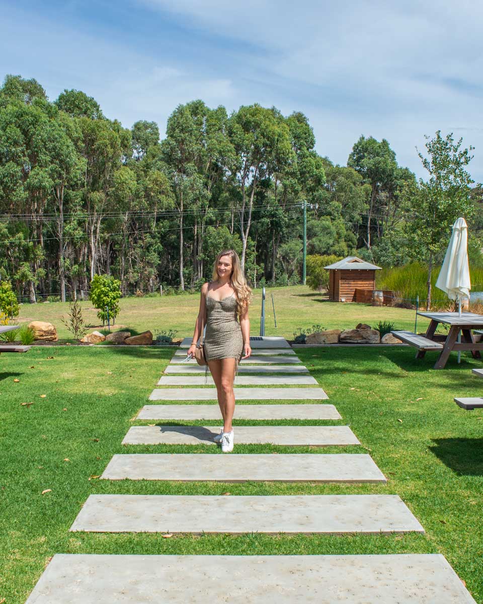 Bailey poses for a photo out the front of a winery in Margaret River