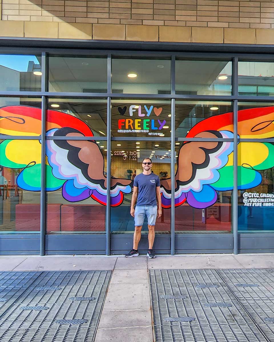 Daniel poses for a photo on the art walk on Stephens Ave