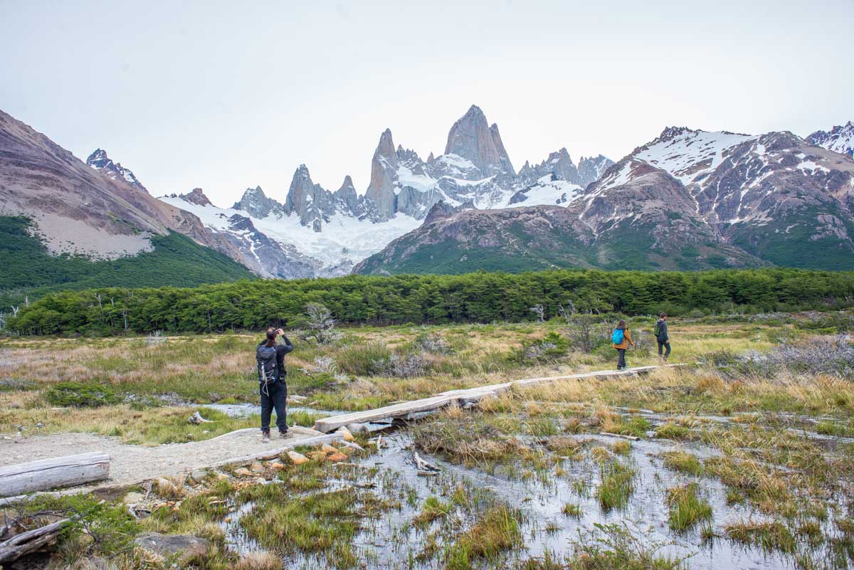 Hikers cross the swamp area on the hike to Mount Fitz Roy Laguna de los Tres