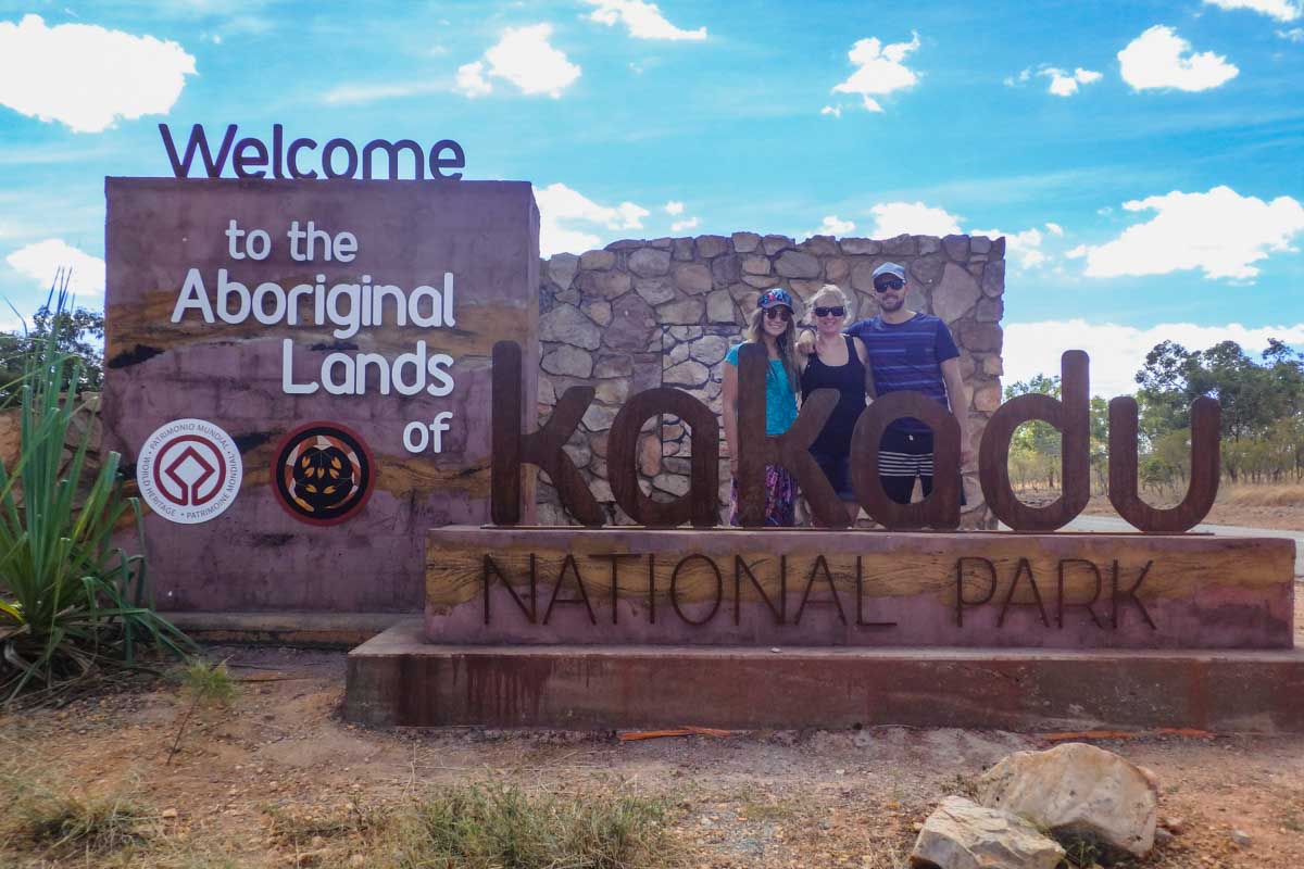 People pose with the Kakadu national Park sign
