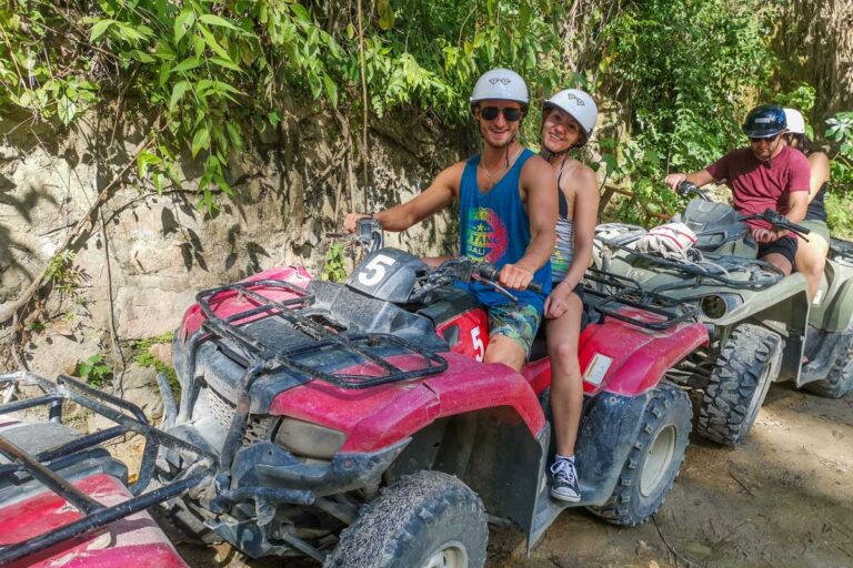 Two-people-sit-on-an-ATV-ready-to-start-the-tour-in-Puerto Vallarta-Mexico