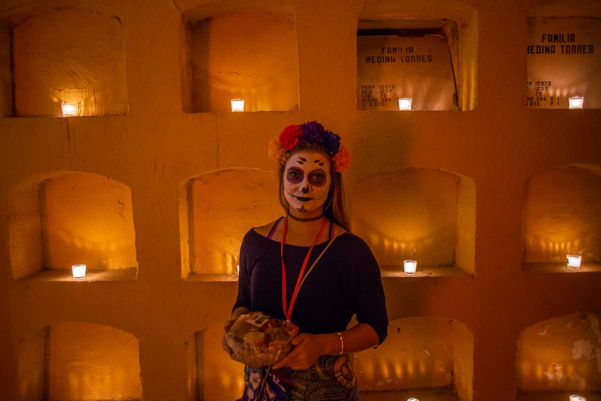 Bailey at a cemetery during Día de los Muertos