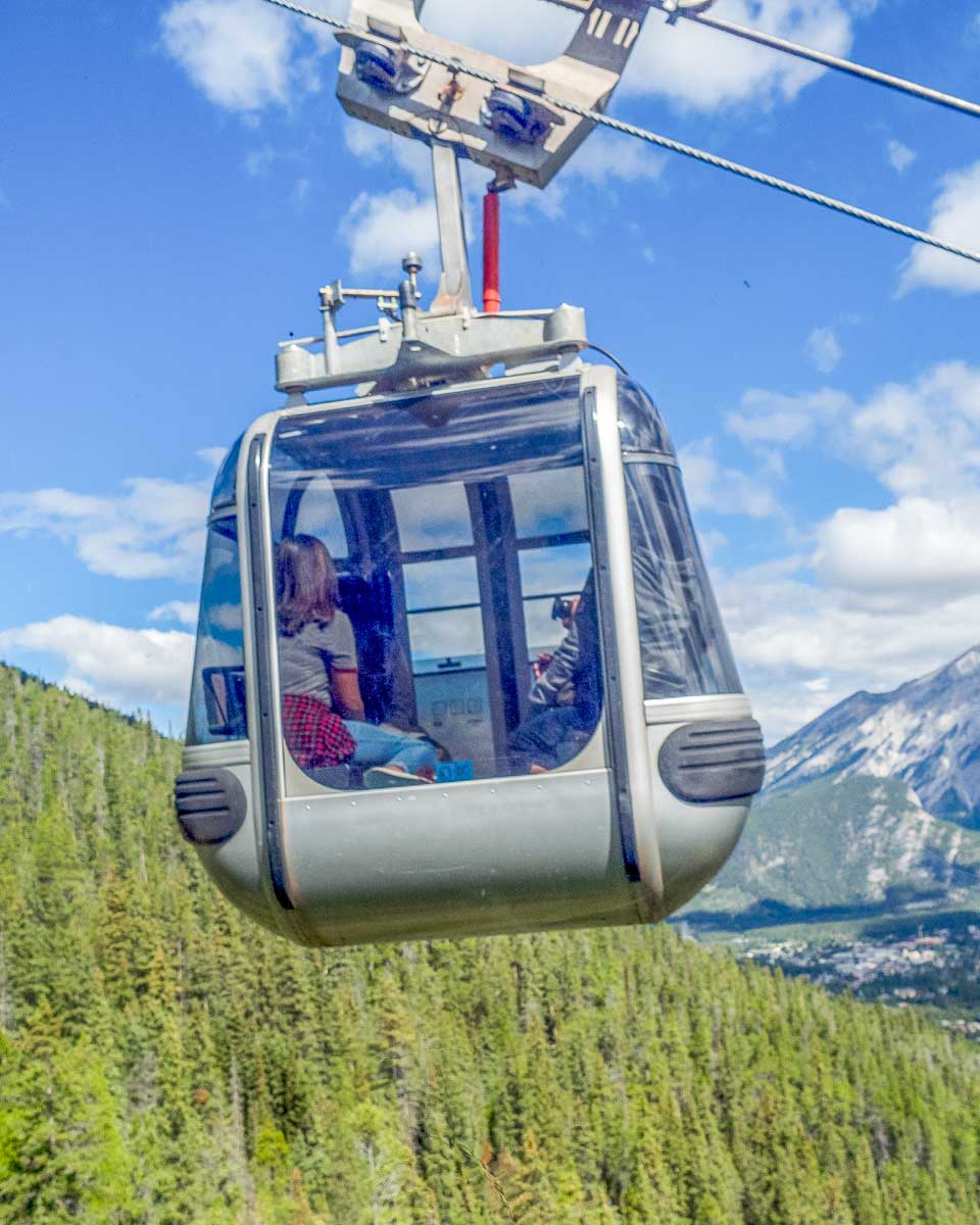 A Banff Gondola Cabe car heads up Sulphur Mountain