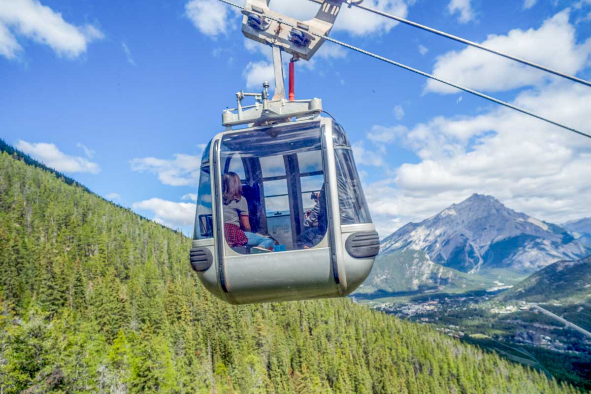 A car on the Banff Gondola heads up the mountain to the sop