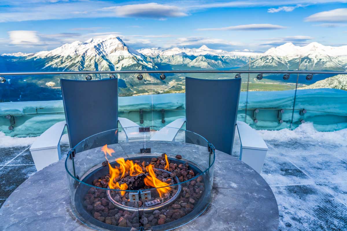 A fire pit at the top of the Banff Gondola during winter on Sulphur Mountain