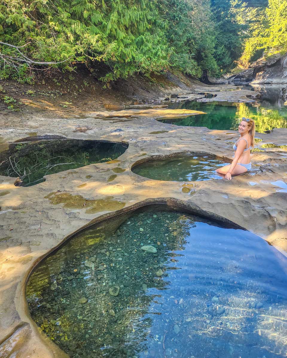 Bailey relaxes in the Oyster River Potholes  in Campbell River, BC