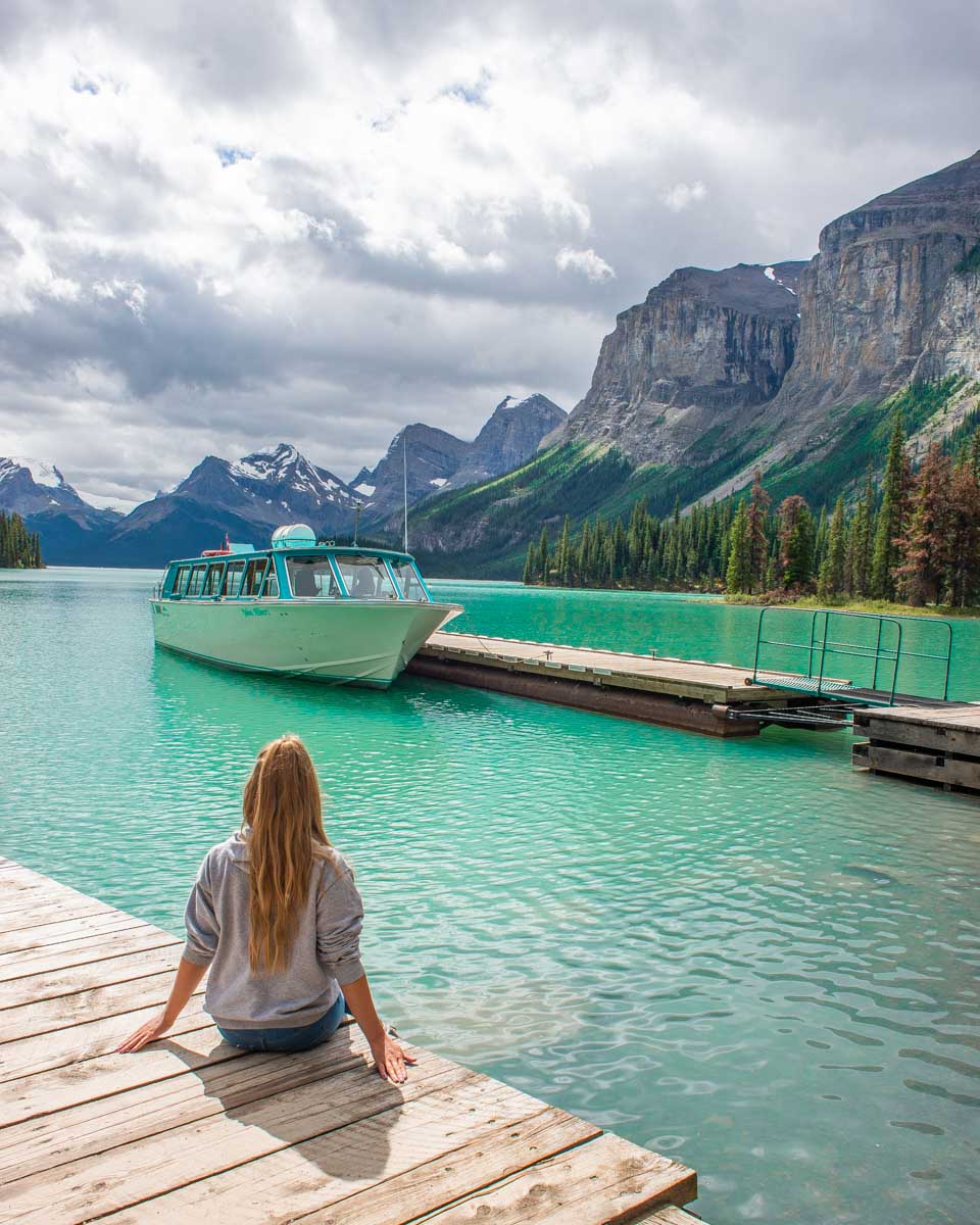 Bailey sits on a dock at Spirit Island, Canada