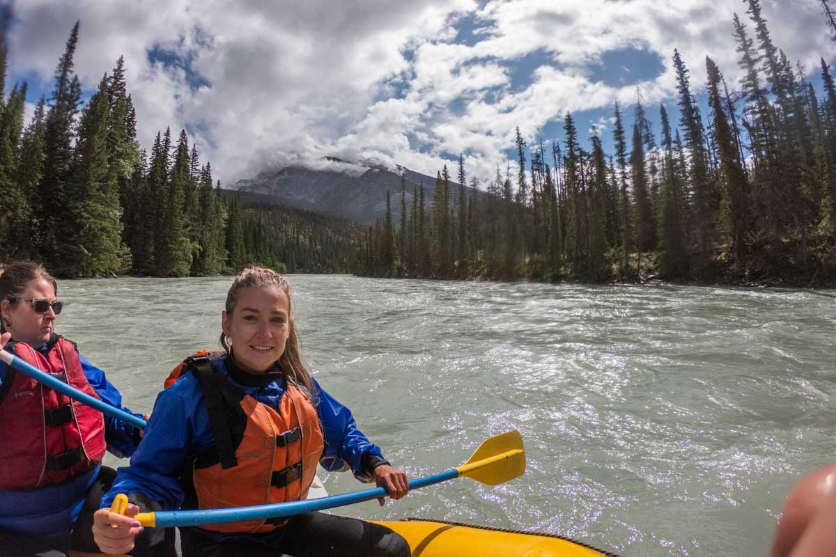 Bailey smiles at the camera on a white water rafting tour in Jasper, Canada