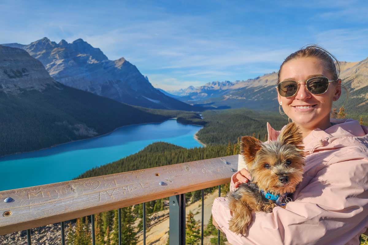 Bailey with her dog rex at Peyto Lake Viewpoint in Banff National Park, Canada