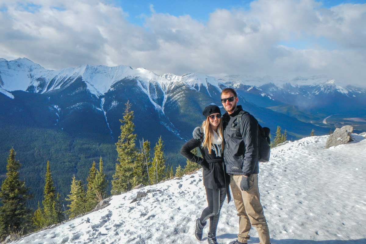 Daniel and Bailey play in the snow at the top oif the Banff Gondola on Sulphur Mountain