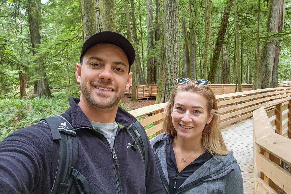 Daniel and Bailey take a selfie on the boardwalk at Cathedral Grove, Vancouver Island