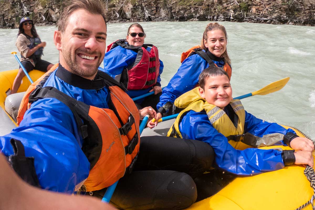 Daniel and Bailey take a selfie with their rafting group in Jasper, Canada