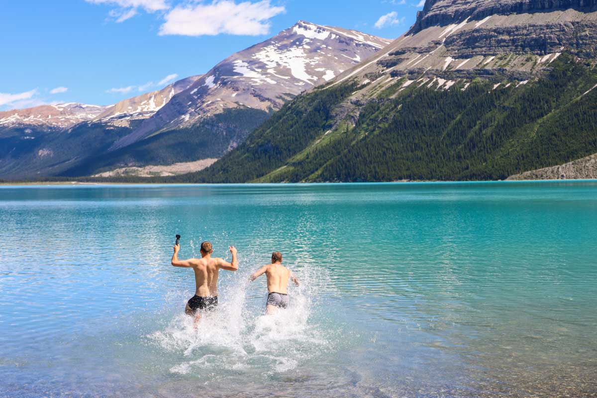 Daniel and his friend run into Berg Lake taking a polar dip in Mount Robson Provincial Park