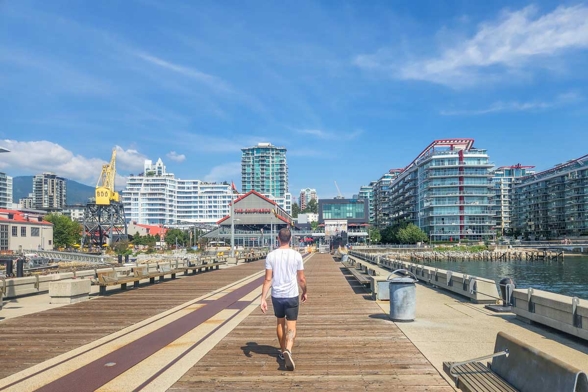 Daniel walks the Burrard Dry Dock Pier in Lonsdale Quay, Vancouver