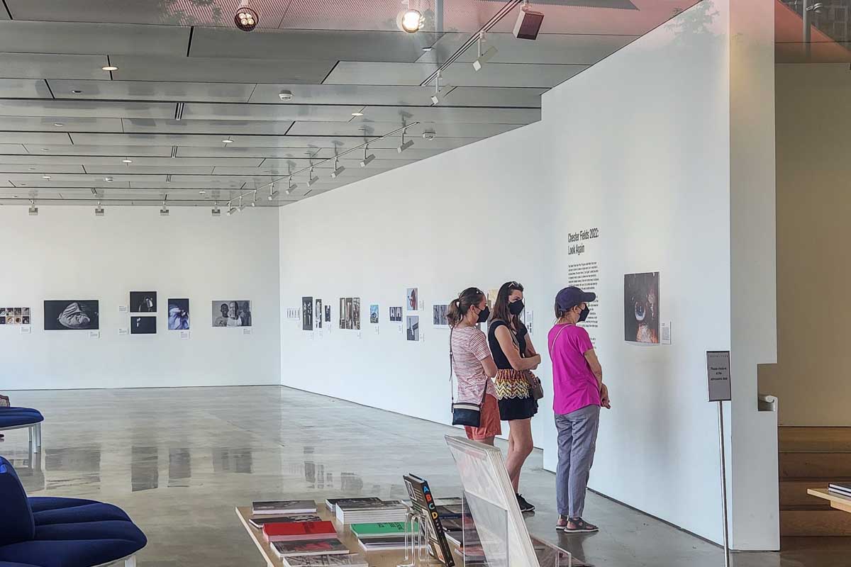 People look at art at the The Polygon Gallery in Lonsdale Quay