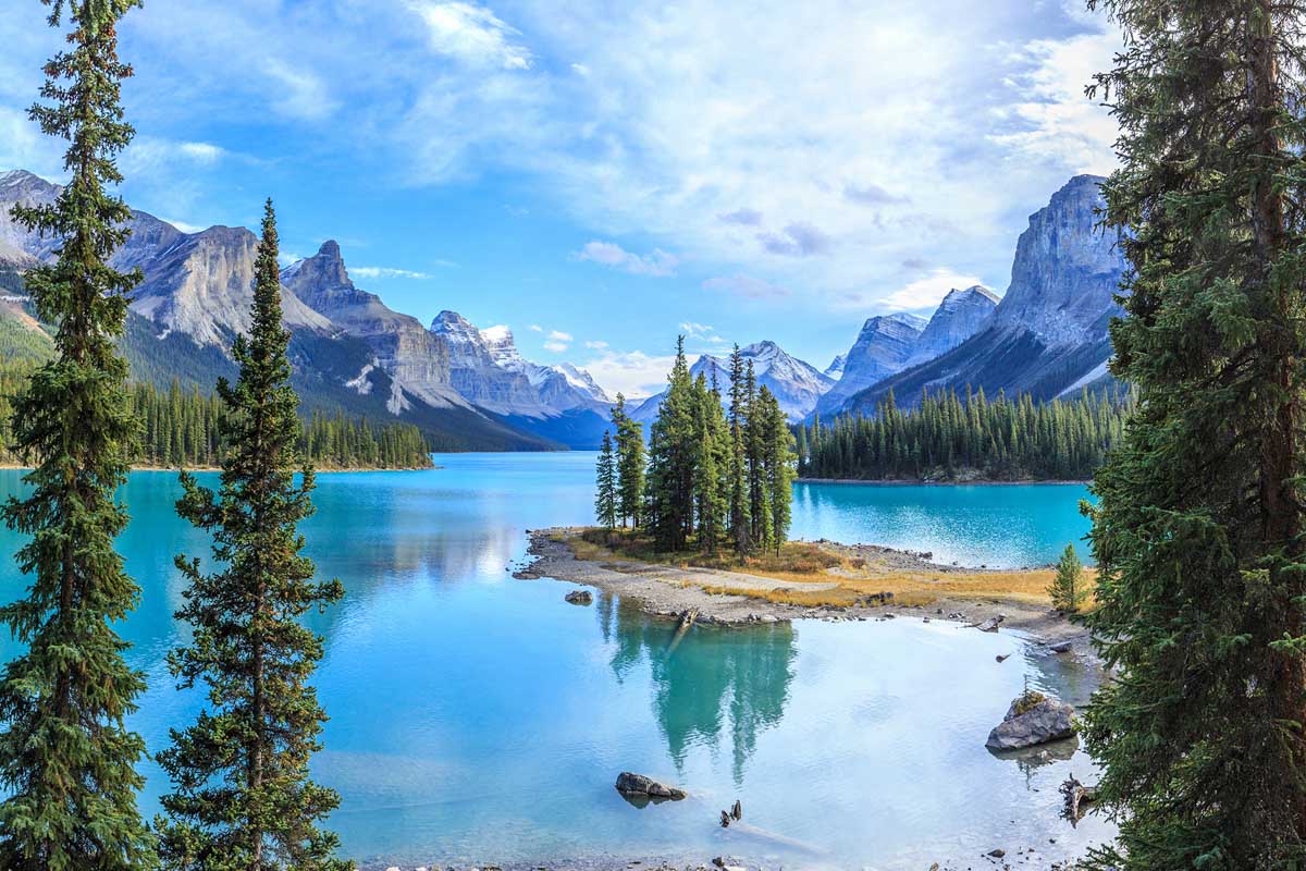 View of Spirit Island Maligne Lake on a sunny day in Jasper National Park, Canada
