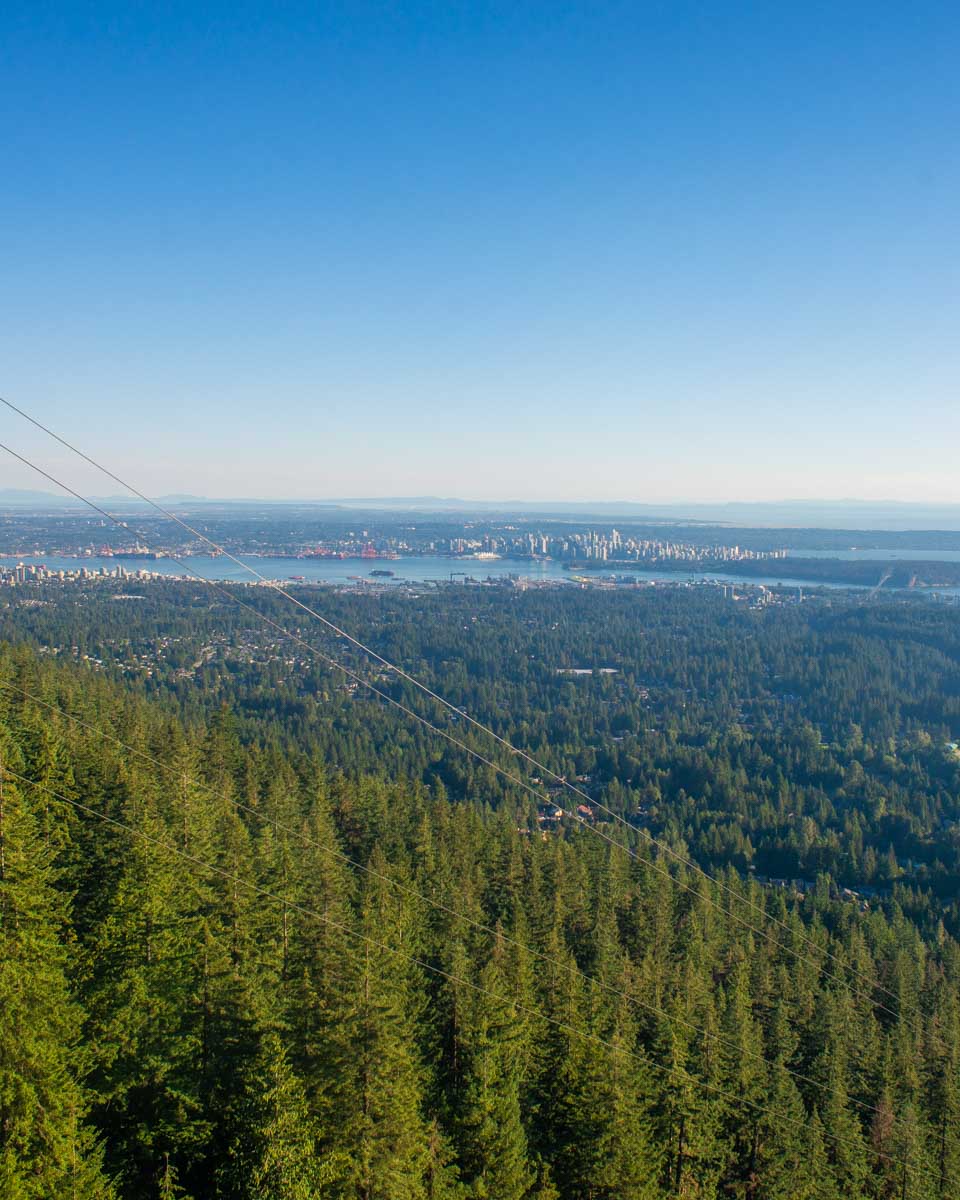 View out the window of the Skyride on the way up Grouse Mountain