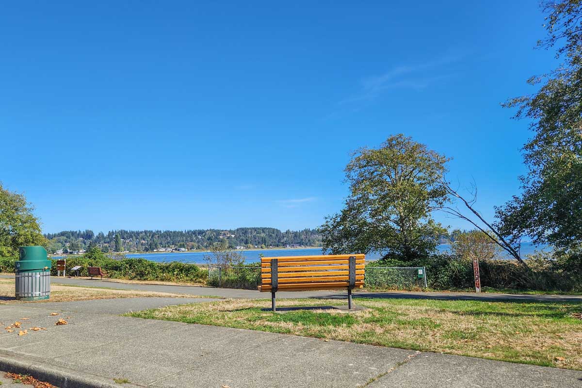 park bench in front the coastline in courtenay BC
