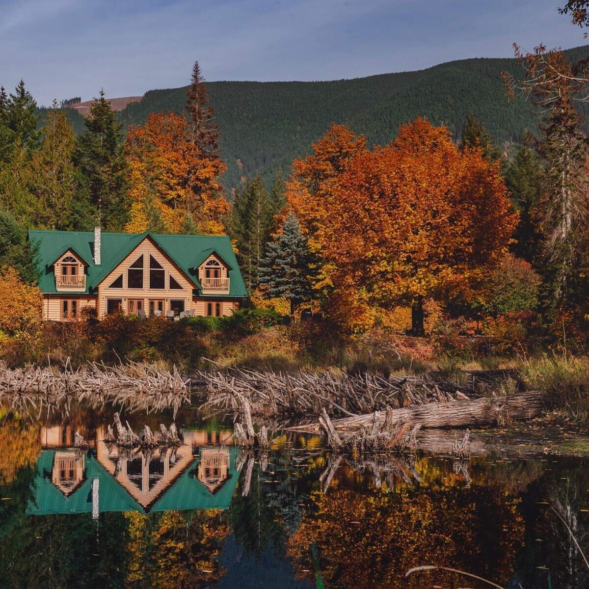 reflection of Cowichan River Lodge on the lake