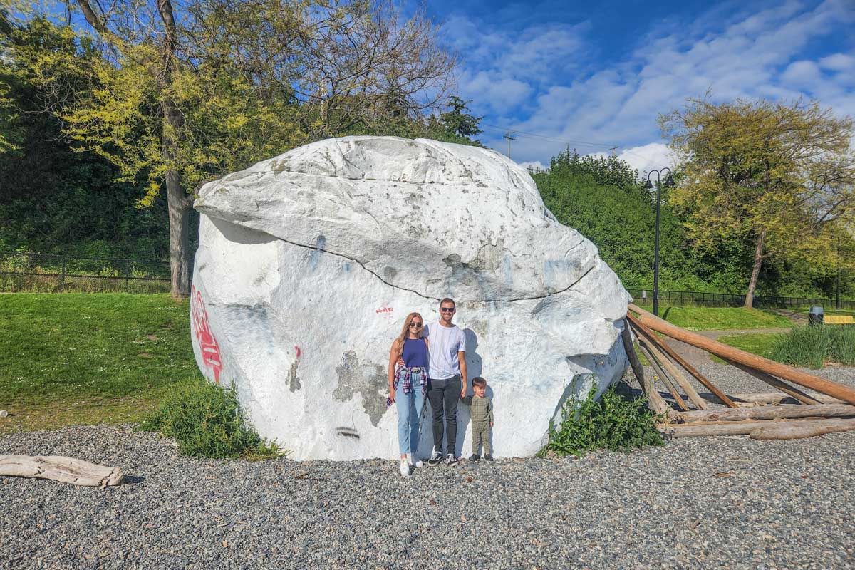 Bailey and Daniel stand with the White Rock in White Rock, BC