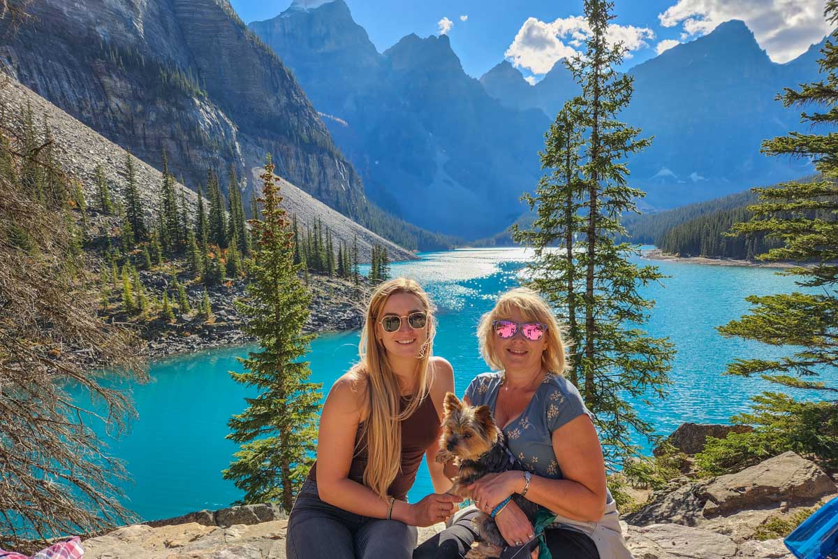 Bailey and her mum at Moraine Lake Rockpile Viewpoint on a sunny afternoon in Banff National Park