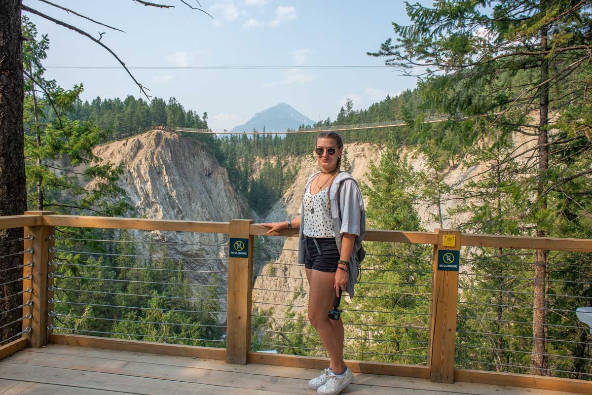 Bailey poses for a photo at one of the viewpoints at the Golden Suspenion Bridge in Golden, BC