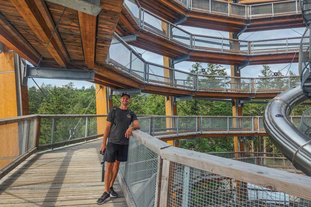 Daniel poses for a photo on the way up the Malahat Skywalk in Malahat, British Columbia