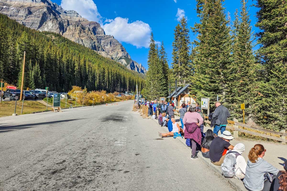 People line up for the bus at Moraine Lake