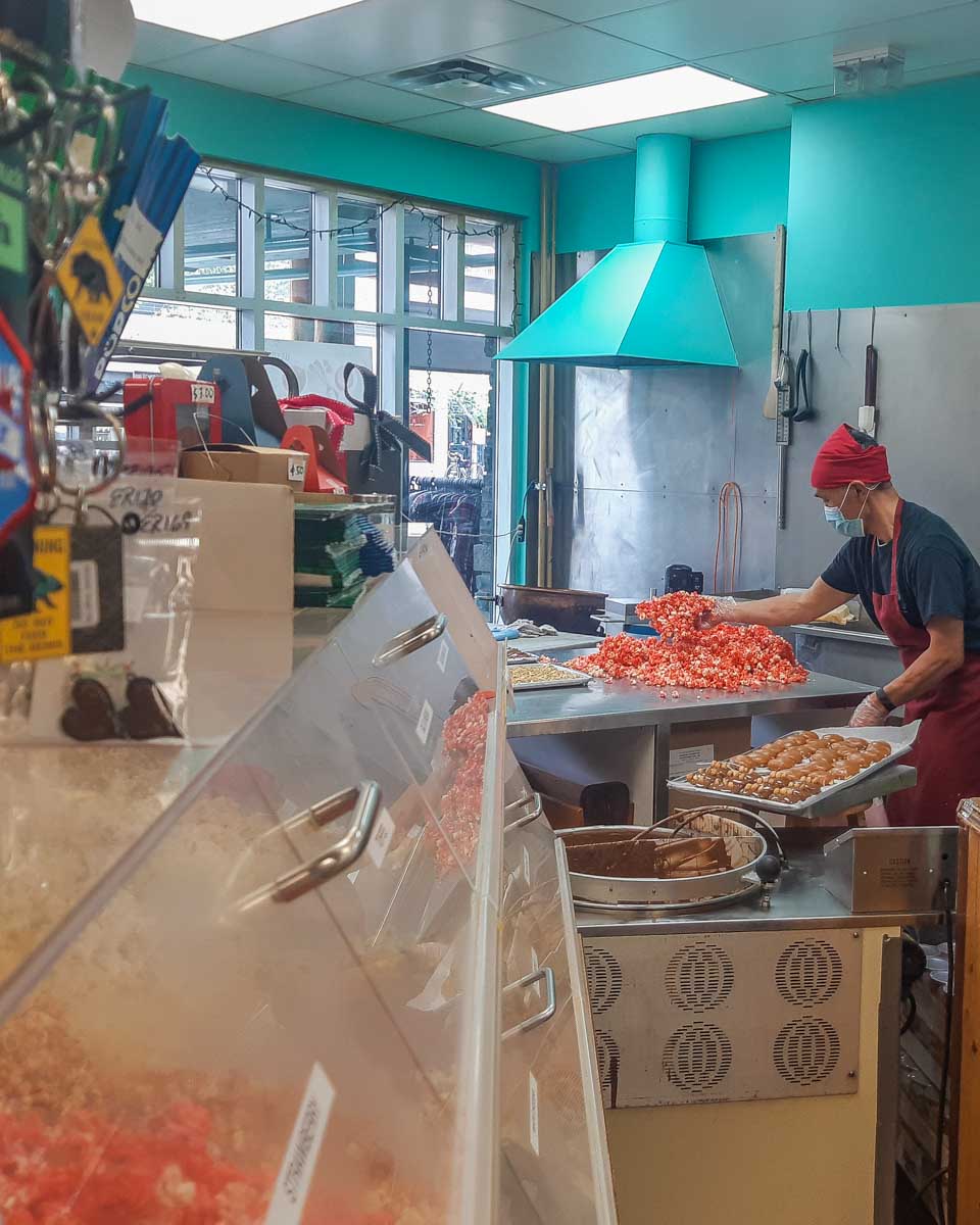 A man makes candy at Candy Bear Lair in Jasper