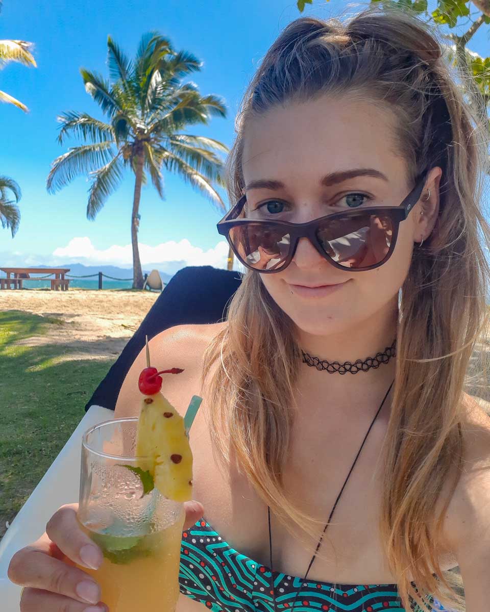 Bailey drinks a cocktail at Malamala Beach Club in Fiji