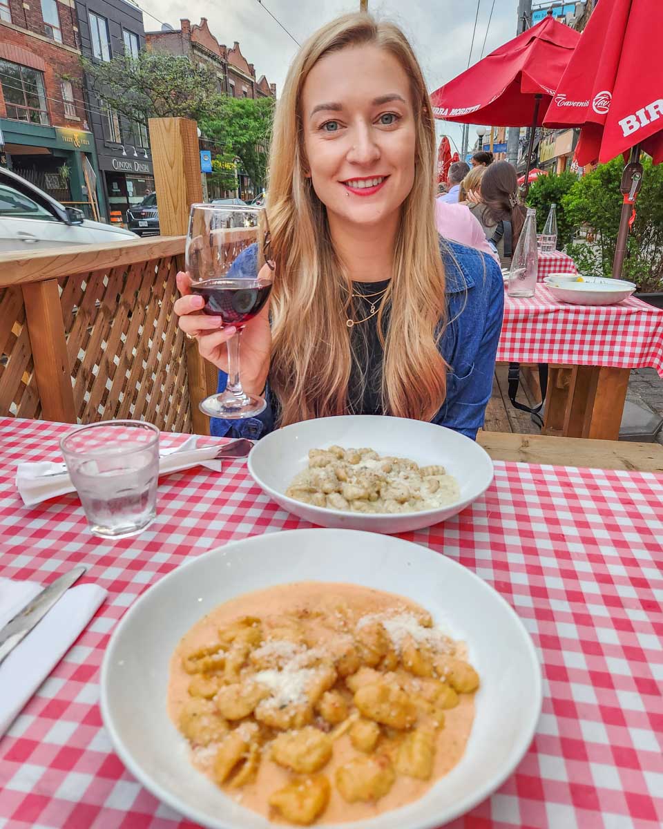 Bailey eats her meal at Trattoria Taverniti in Little Italy, Toronto