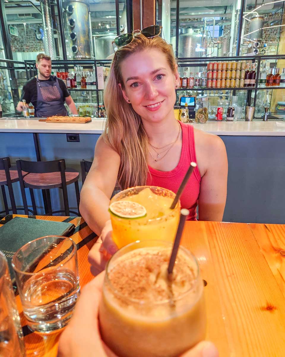 Bailey enjoys a drink at Spirit Of York distillery in the Distillery District of Toronto