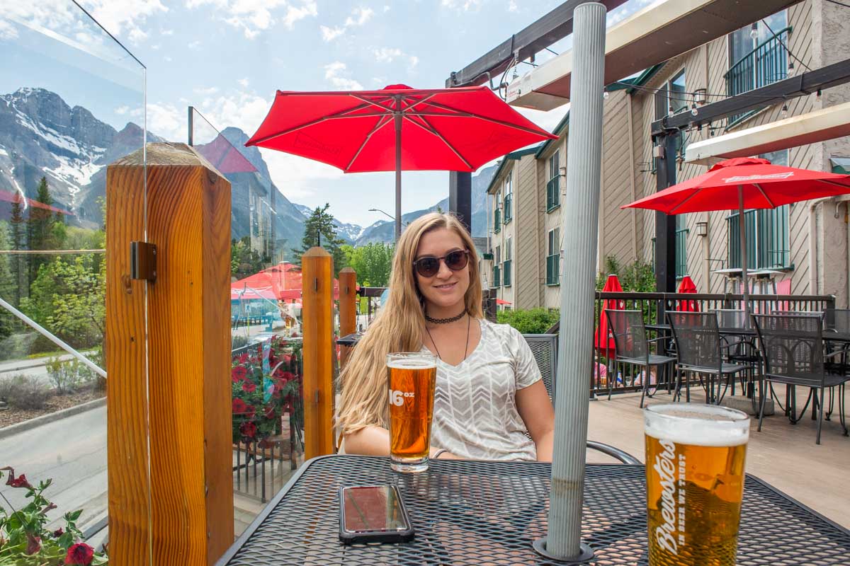 Bailey enjoys a drink at The Drake in Canmore