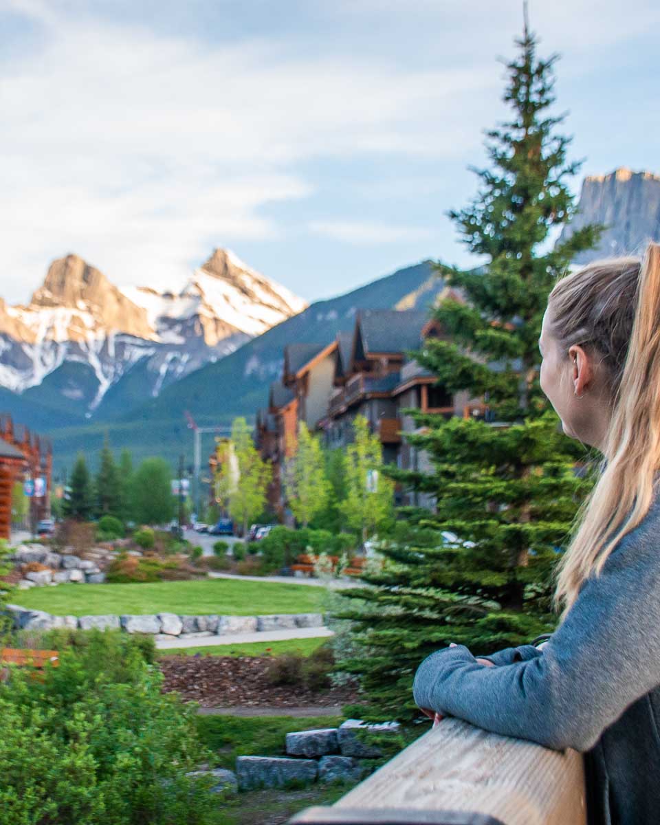 Bailey enjoys the view of the Three Sisters in Canmore from the Policemans Creek Boardwalk
