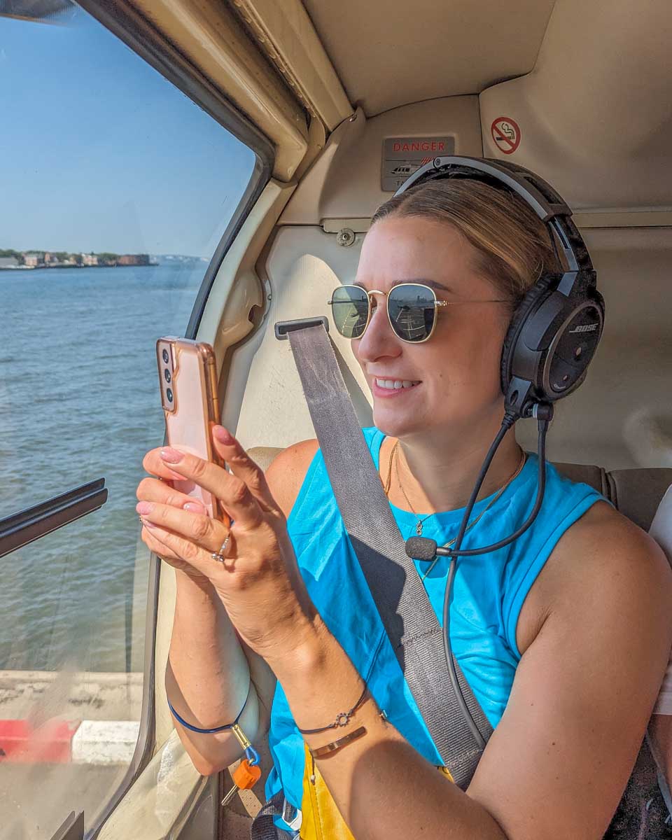 Bailey in a helicopter about to fly over Toronto City in Toronto, Canada