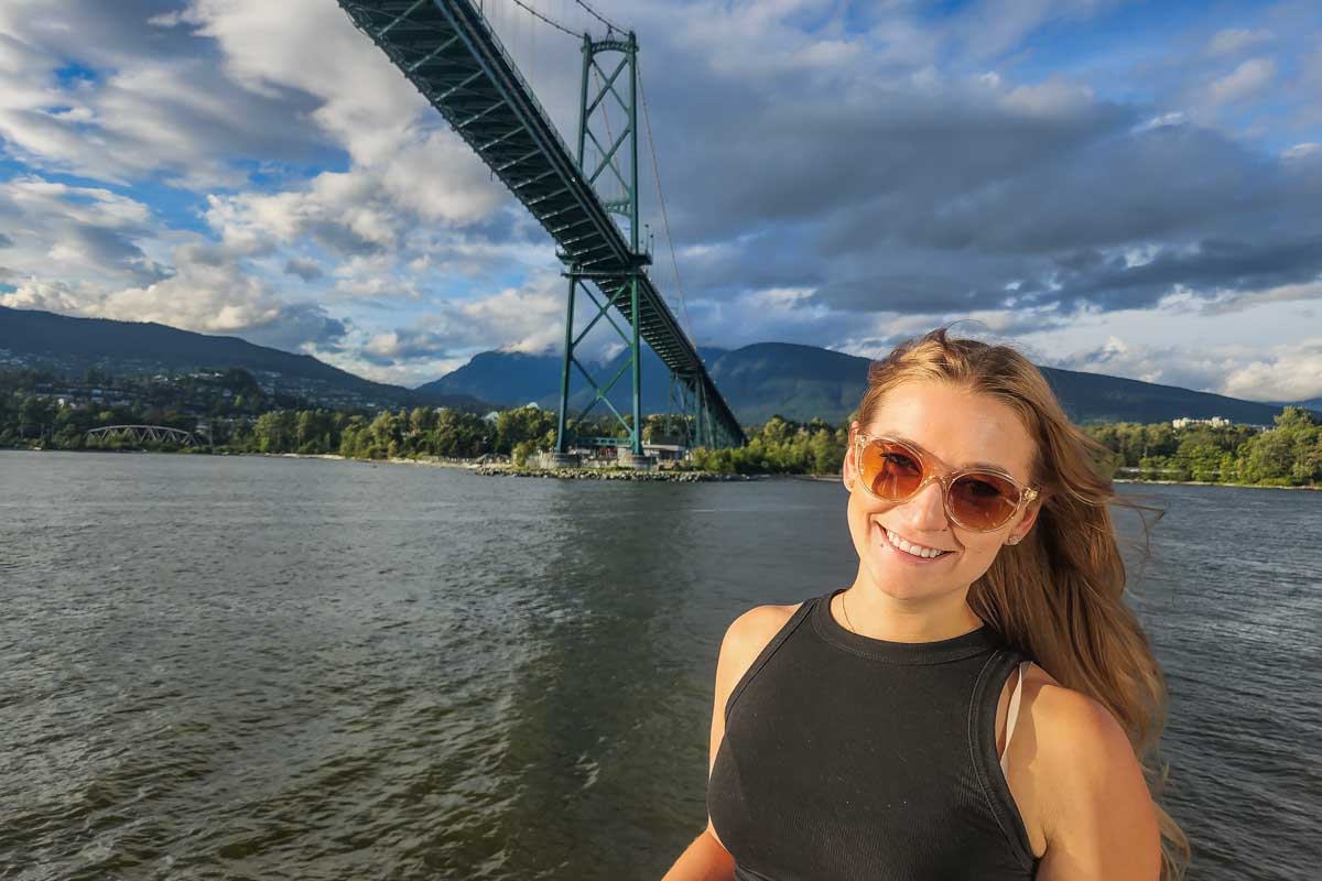 Bailey on a sunset cruise in Vancouver with the Lions Gate Bridge in the background