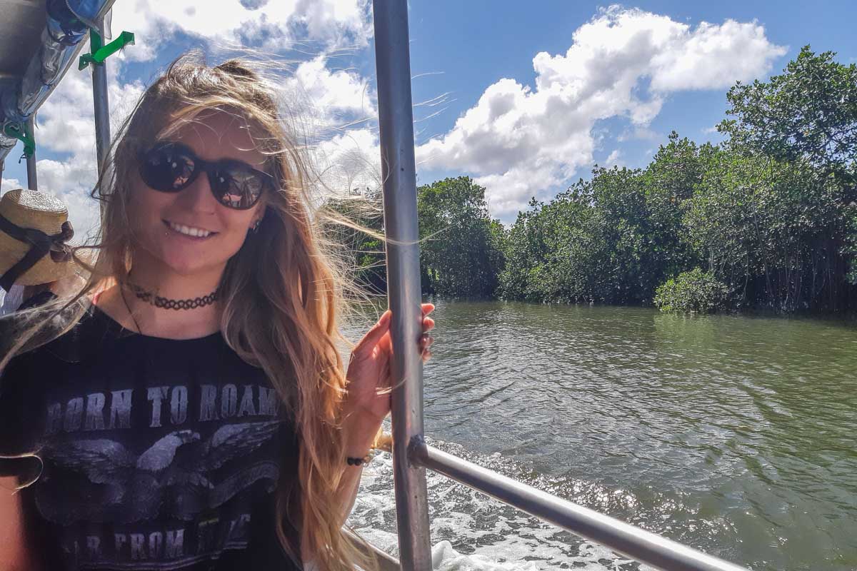 Bailey poses for a photo on a river cruise in Fiji