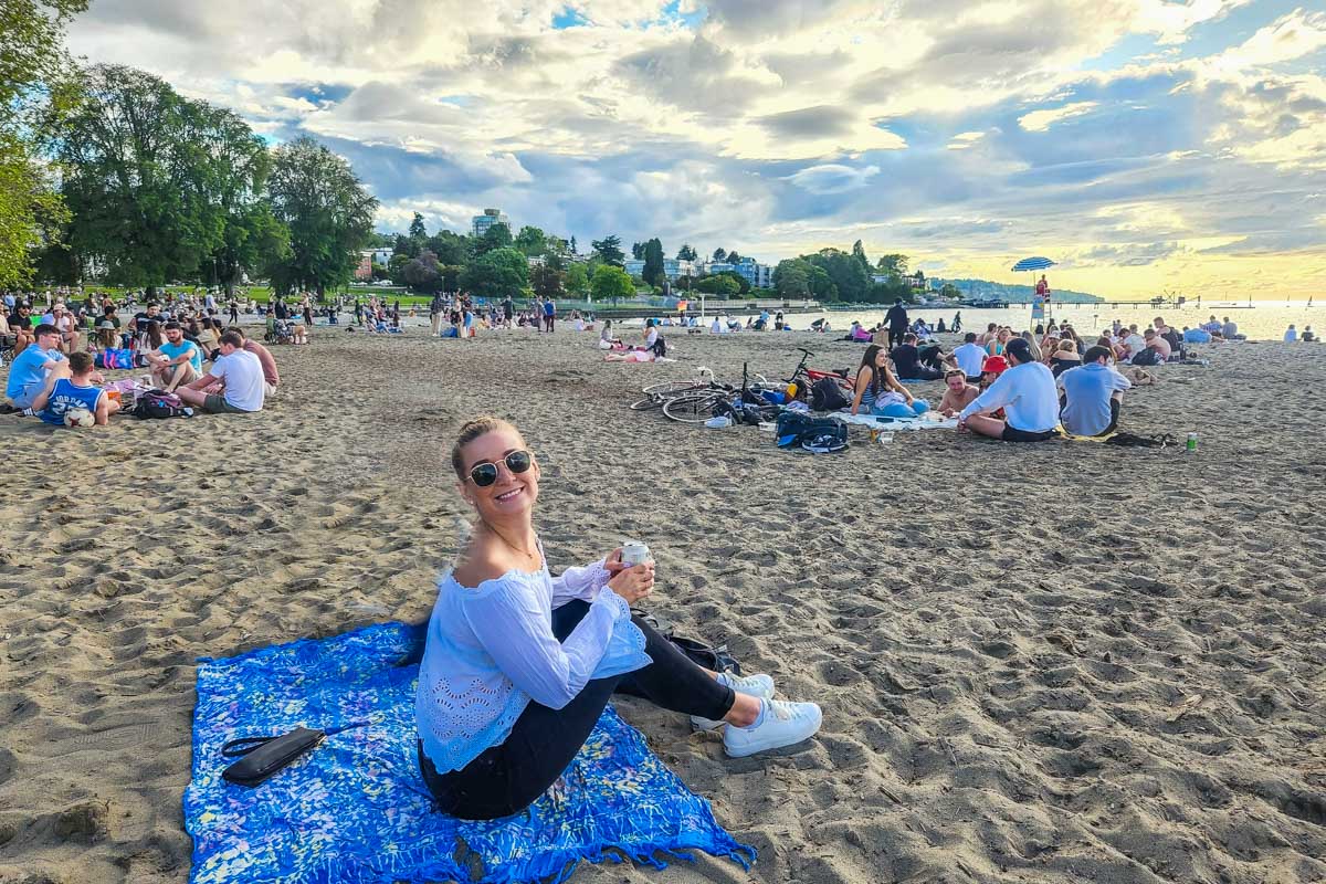 Bailey relaxing at Kitsilano Beach at sunset in Vancouver