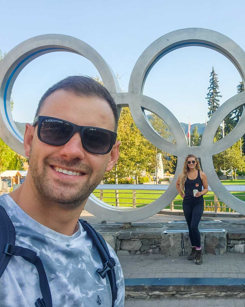 Daniel and Bailey take a selfie at the Whitler Olympic rings in Whistler Town