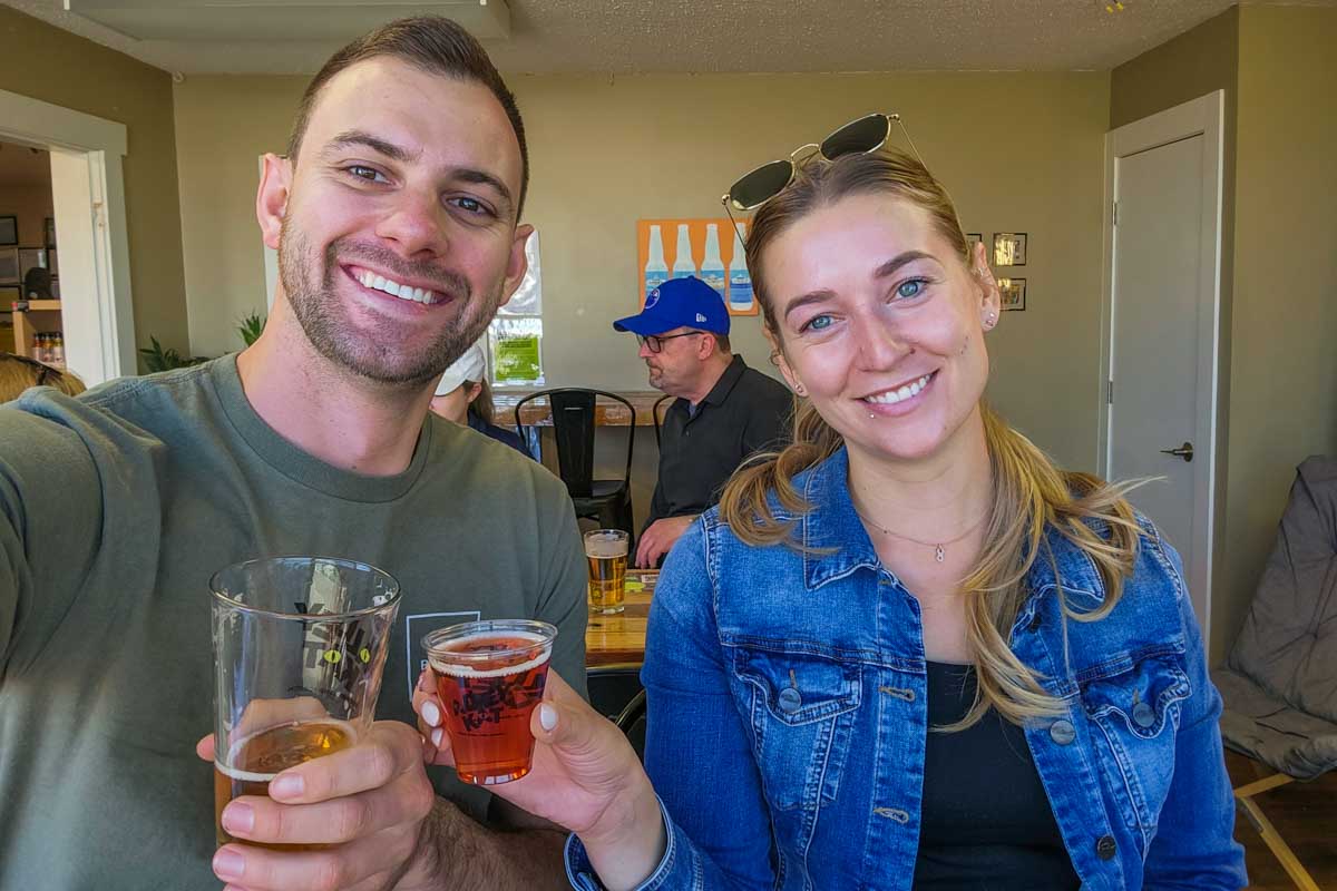 Daniel and Bailey take a selfie on a brewery tour in Toronto