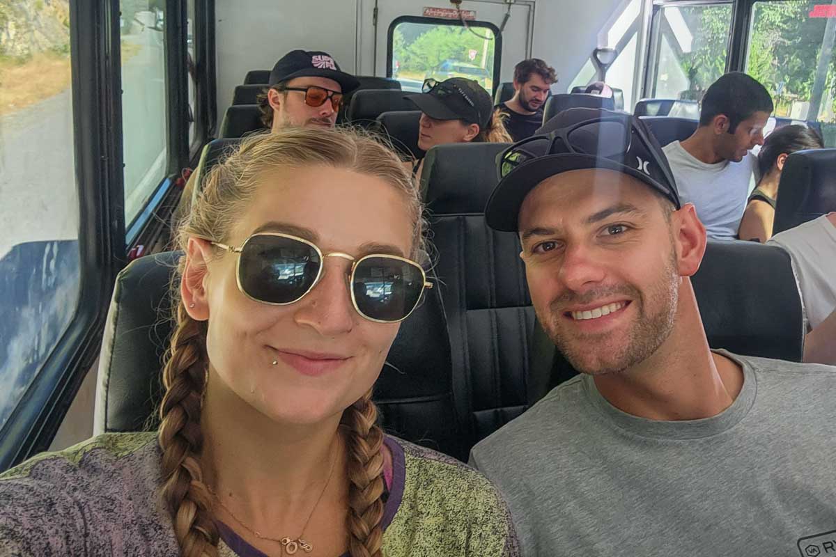 Daniel and Bailey take a selfie on a bus in Whistler