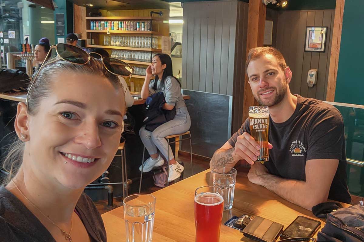 Daniel and Bailey taste beer at Granville Island Brewing