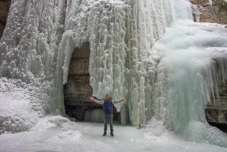 Daniel poses for a photo in Maligne Canyon, Jasper in winter