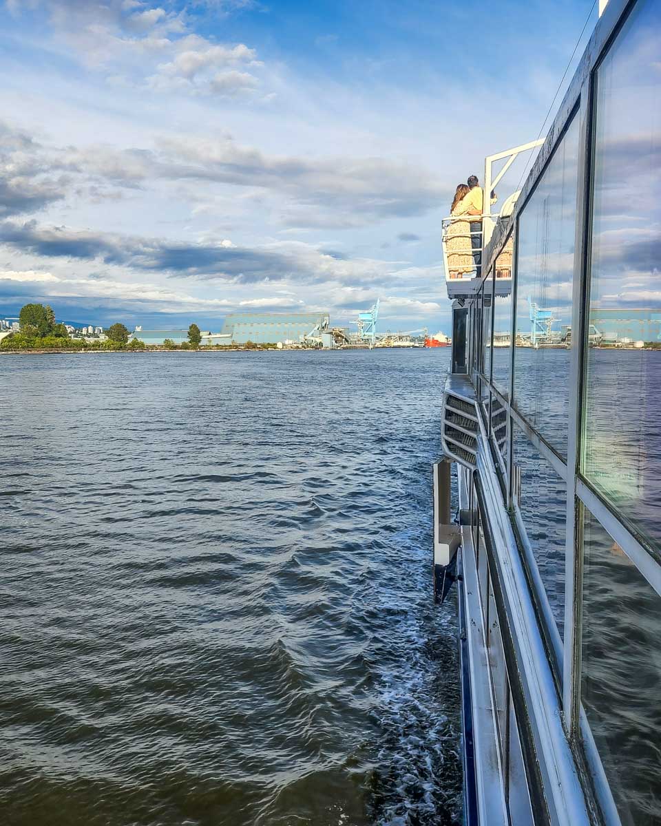 View of the boat and views on a sunset cruise in Vancouver, Canada