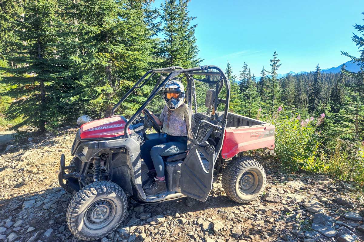 Bailey sits in an ATV in Whistler, BC
